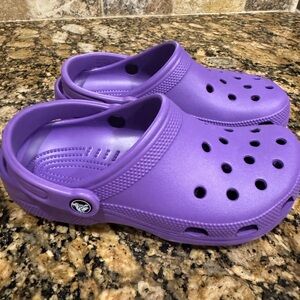 Crocs sandals. Womens size 7. Dark purple. Brand new.